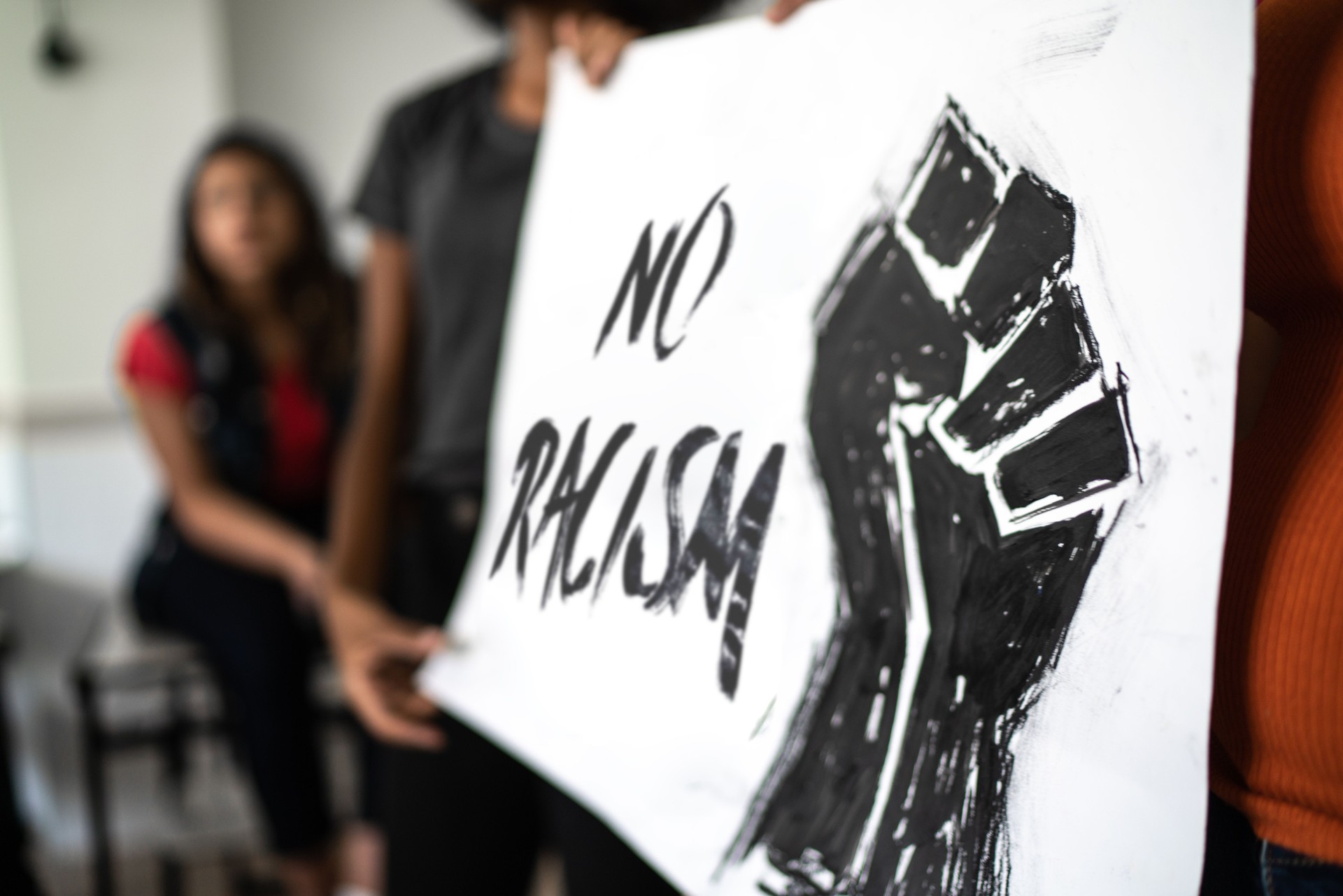 Students doing a presentation about racism